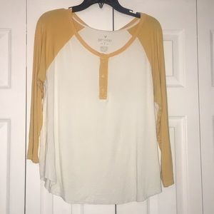 Cream/yellow shirt